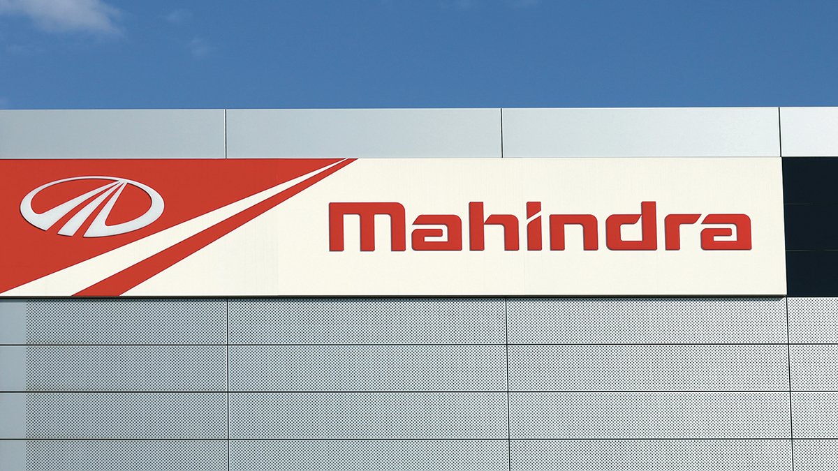 Cellphone with Logo of Indian Automotive Company Mahindra Mahindra Limited  on Screen in Front of Website. Editorial Image - Image of internet,  manufacturer: 222429090